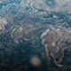 A closer view of the storms, slightly adjusted for brightness.